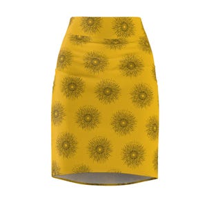 May include: Mustard yellow pencil skirt featuring a repeating pattern of stylized sunburst designs in a darker shade. The skirt has a high waist and a fitted silhouette, suitable for various occasions.