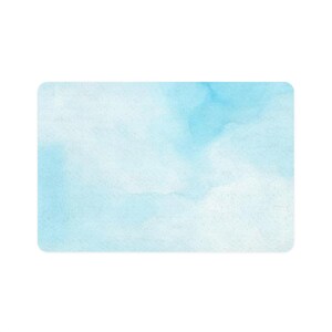 May include: A light blue watercolor background with a soft, cloudy effect.