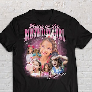 May include: Black t-shirt with a pink graphic that says "Aunt of the Birthday Girl" and features a collage of photos of young girls. The text "Jessica" is written in cursive at the bottom of the graphic.