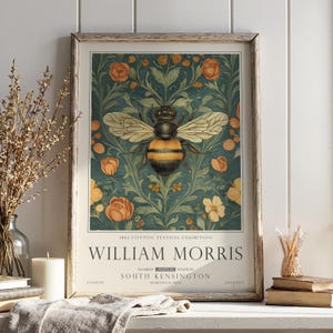 May include: A framed art print with a bee illustration set against a floral pattern. The print includes the text "WILLIAM MORRIS" and details about the 1861 Cotton Textiles Exhibition, with a London and England location.