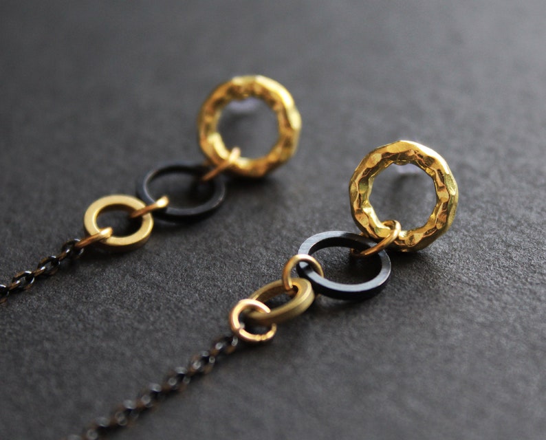 Earbud earrings in black and gold with silicone loop ring, anti-lost earpods holder chain, long dangle brass circle round stud modern Obila image 2