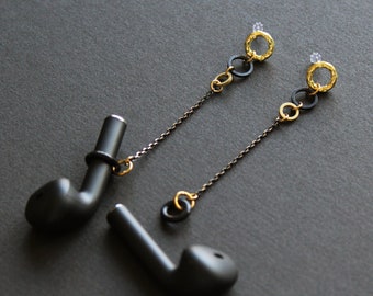 Earbud earrings in black and gold with silicone loop ring, anti-lost earpods holder chain, long dangle brass circle round stud modern -Obila