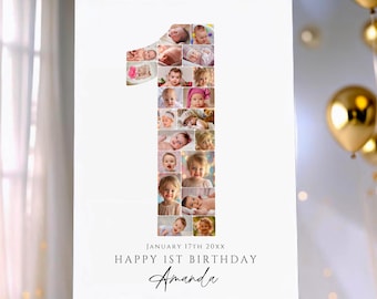 May include: A white sign with a large number one made of baby photos. The sign reads "Happy 1st Birthday Amanda" with the date "January 17th 20XX" below the number. The sign is displayed on a wooden easel.