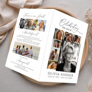 Puede incluir: Un programa conmemorativo plegado titulado Celebrating the Life of Olivia Hodder, que presenta varias fotografías de una persona, una sección de agradecimiento y detalles del funeral impresos en texto negro sobre un fondo de papel blanco.