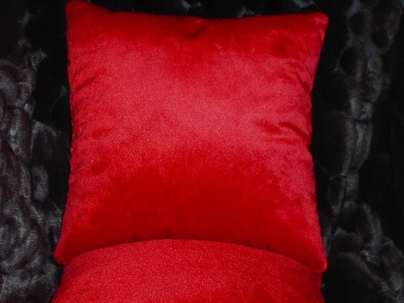 red fur throw pillows