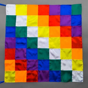 May include: A colourful flag with a checkered pattern of 36 squares. The squares are arranged in a grid of six rows and six columns. The colours of the squares are red, orange, yellow, green, blue, purple, and white.