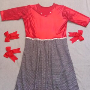 Red and black dress with polka dots. Done by hand.