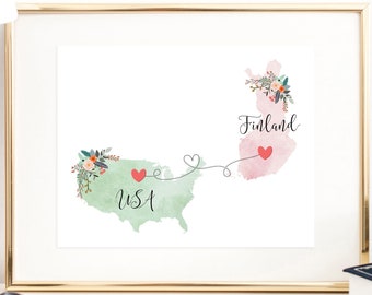 May include: A watercolour print of a map of the USA and Finland connected by a dotted line with hearts. The USA is green and Finland is pink. The text "USA" and "Finland" are written on the maps.
