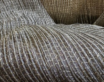 Hand Woven Pleated Organza;  Black and silver with gold lurex.