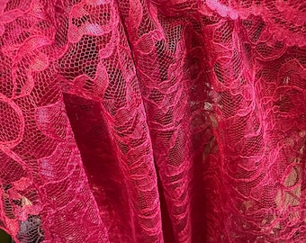 Chantilly lace in cranberry for the holiday season or anytime of year!  Woven in France.