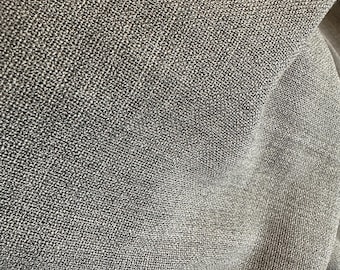 Wool woven in soft two-toned steel gray.  Made in Italy.