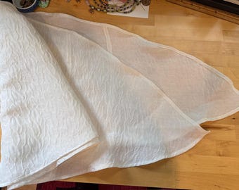Capelet, in softly hued ivory silk and linen Matelasse.