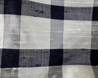 Silk shantung woven in a white and navy checkerboard pattern.