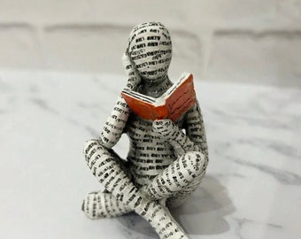 resin reading book figure