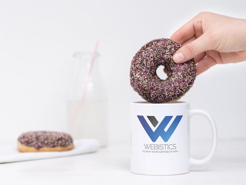 Chocolate sprinkle donut held above Sopranos fan art mug with iconic Tony Soprano quote. A must-have for The Sopranos fans who love a coffee break with mob boss flair.