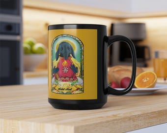 May include: Black ceramic mug with a yellow background and a colorful illustration of a black dog with a red heart and the text "Saint Neet".
