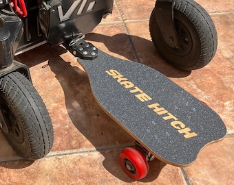 The SkateHitch - A Passenger/Companion Platform for power wheelchairs. Ride along on a skateboard that is towed behind the chair!