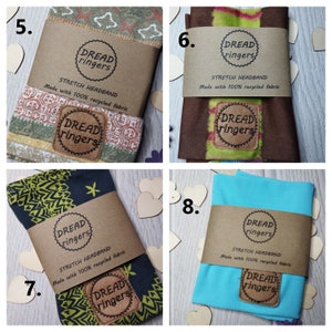 May include: Four brown paper-wrapped headbands with a green, yellow, and brown patterned fabric. Each headband has a brown label with the text "DREAD ringers" and "STRETCH HEADBAND Made with 100% recycled fabric".