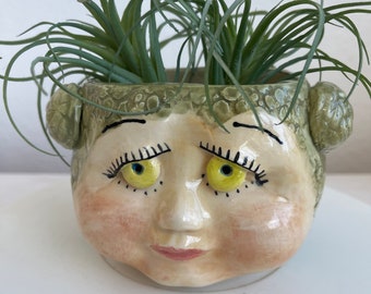 Fern doll head planter
