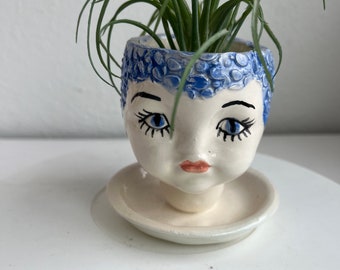 Nosy Emily doll head planter