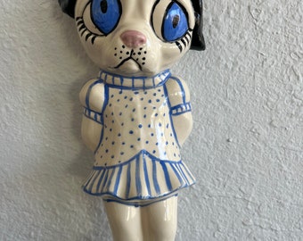 Poppy ceramic wall doll