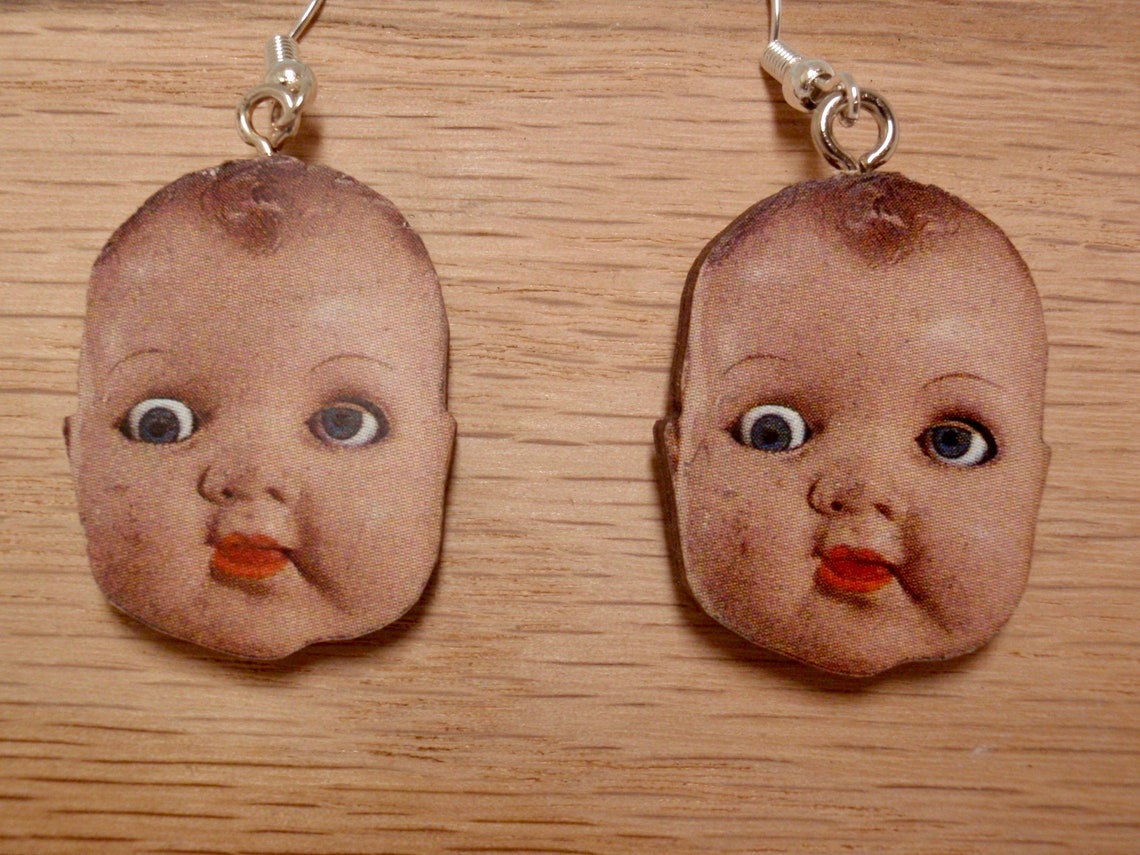 Baby doll face earrings Etsy