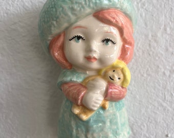 Little Melinda wall doll