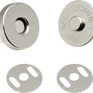 May include: Set of four silver magnetic snap closures. Two round, flat pieces with a central magnet and a protruding post. Two matching circular plates with slotted holes for sewing or attachment. Ideal for bags and crafts.