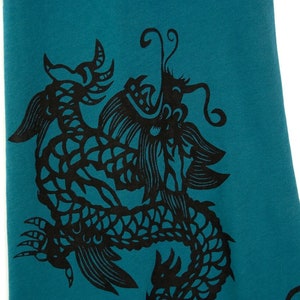 Dragon extra long jade scarf. Chinese cut paper lantern motif. Silkscreen print, black on teal green pima cotton. Long scarf, no fringe