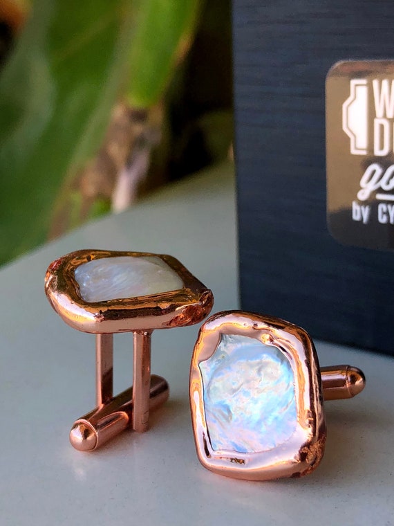 Iridescent freshwater coin pearls set in hand-electroformed copper bezels — men's cufflinks that are actually interesting, not just shiny circles.