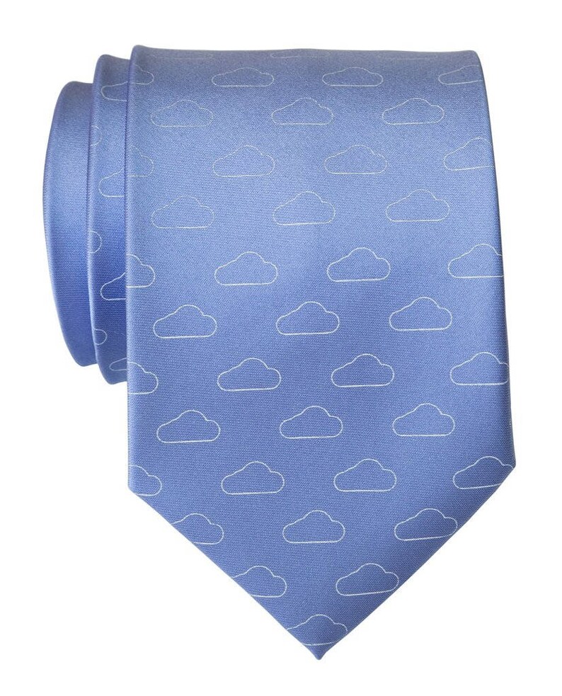 May include: A blue silk tie with a white cloud pattern.
