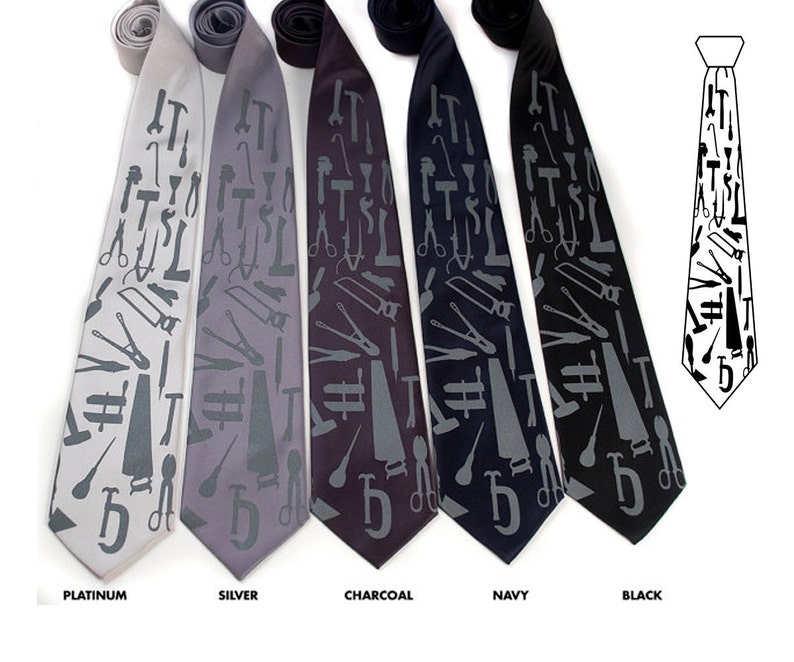 May include: Five silk ties with a repeating pattern of tools in gray on different colored backgrounds: platinum, silver, charcoal, navy, and black.