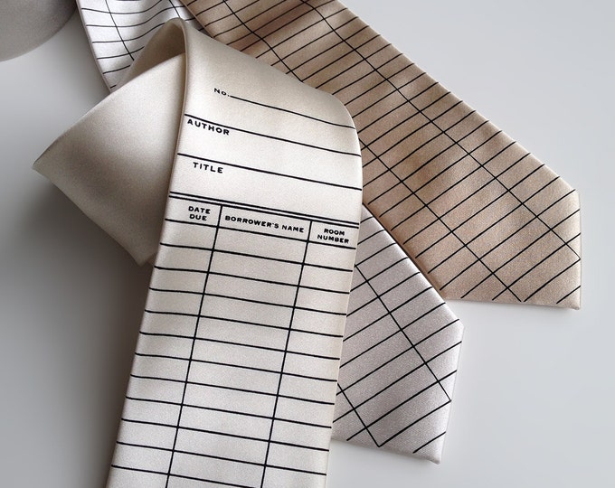 Library date due necktie. Due date card tie. Silkscreen printed men's tie. Literary, teacher, librarian, writer, bookworm, reading gift.
