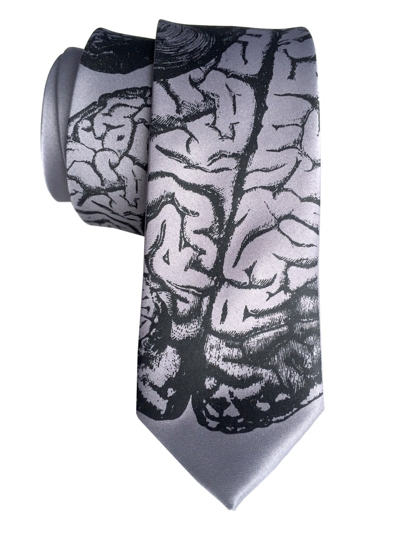 May include: A gray silk tie with a black and white anatomical brain print.