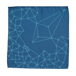 May include: A blue cotton pocket square with a white geometric pattern of connected circles and lines.