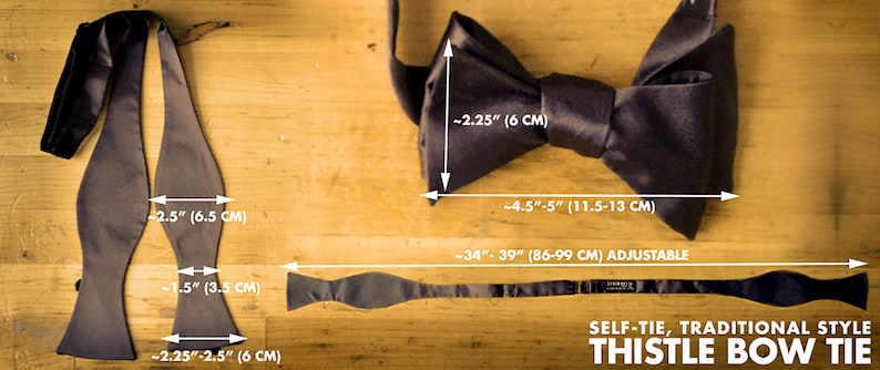 May include: A self-tie, traditional style thistle bow tie in black satin. The bow tie measures approximately 2.5 inches wide and 4.5 to 5 inches long. The tie is adjustable and measures 34 to 39 inches in length.