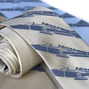 Plane Stripe silkscreen silk necktie. Fighter jet print. Steel blue ink on a range of silk colors.