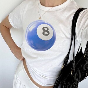 Magic 8 ball baby Tee | Y2k Baby Tee| retro eight ball tee| 8 ball graphic tee| cool girl tees| downtown girl tee| graphic printed baby tee