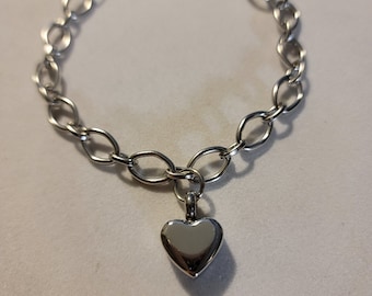 Bracciale con urna funeraria a forma di cuore in argento: gioiello commemorativo in acciaio inossidabile