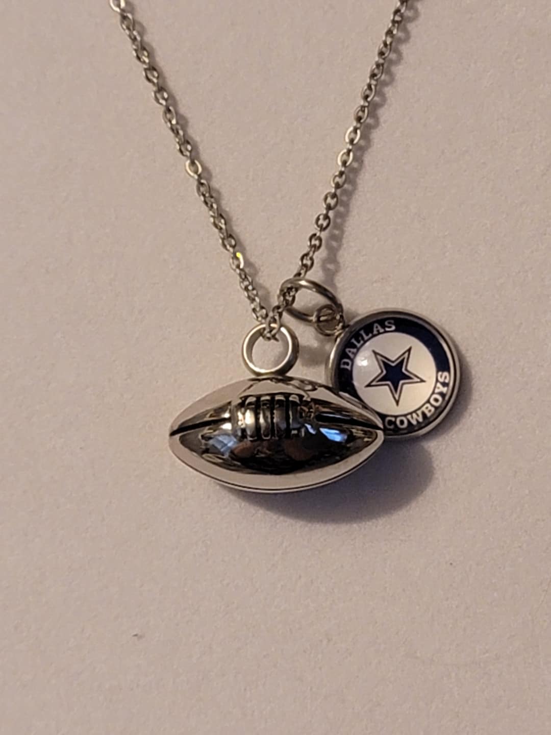 Minicremation Collana con urna a forma di pallone da calcio americano
