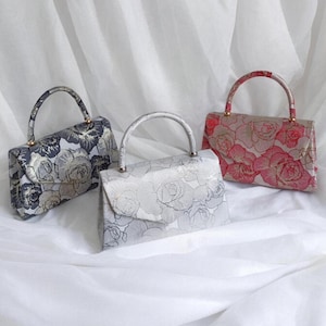 Pochette à poignée sur le dessus à imprimé jacquard floral texturé irisé - Noir, or, rose, argent, rouge