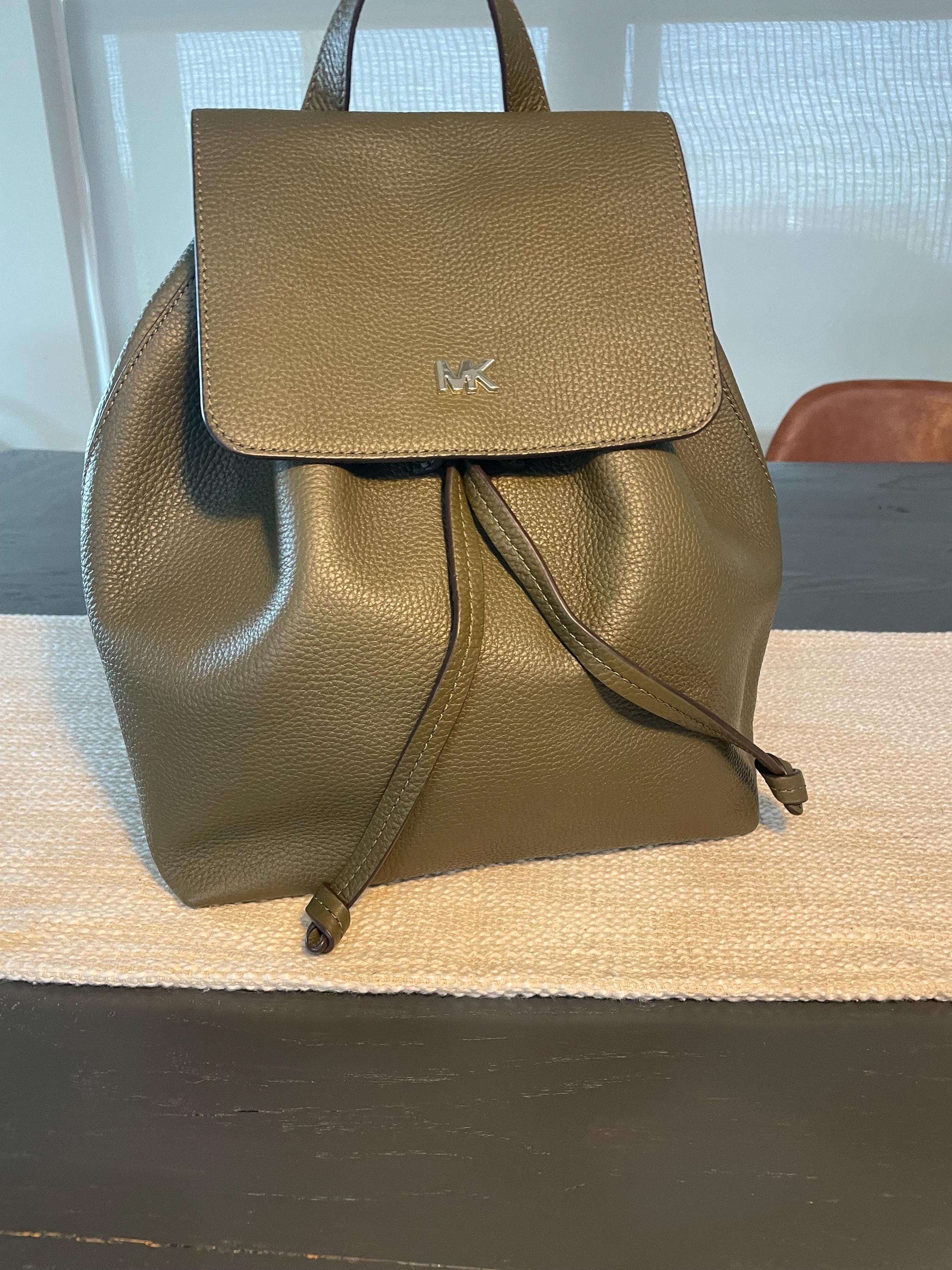 MK Junie Backpack in Olive Pebbled Leather. Drawstring Style 
