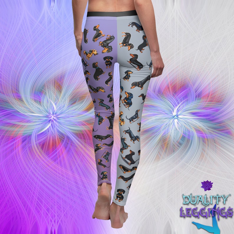Back view of a person wearing Duality Leggings with dachshunds illustrations.
The left leg has lilac background, the right leg has grey background.
