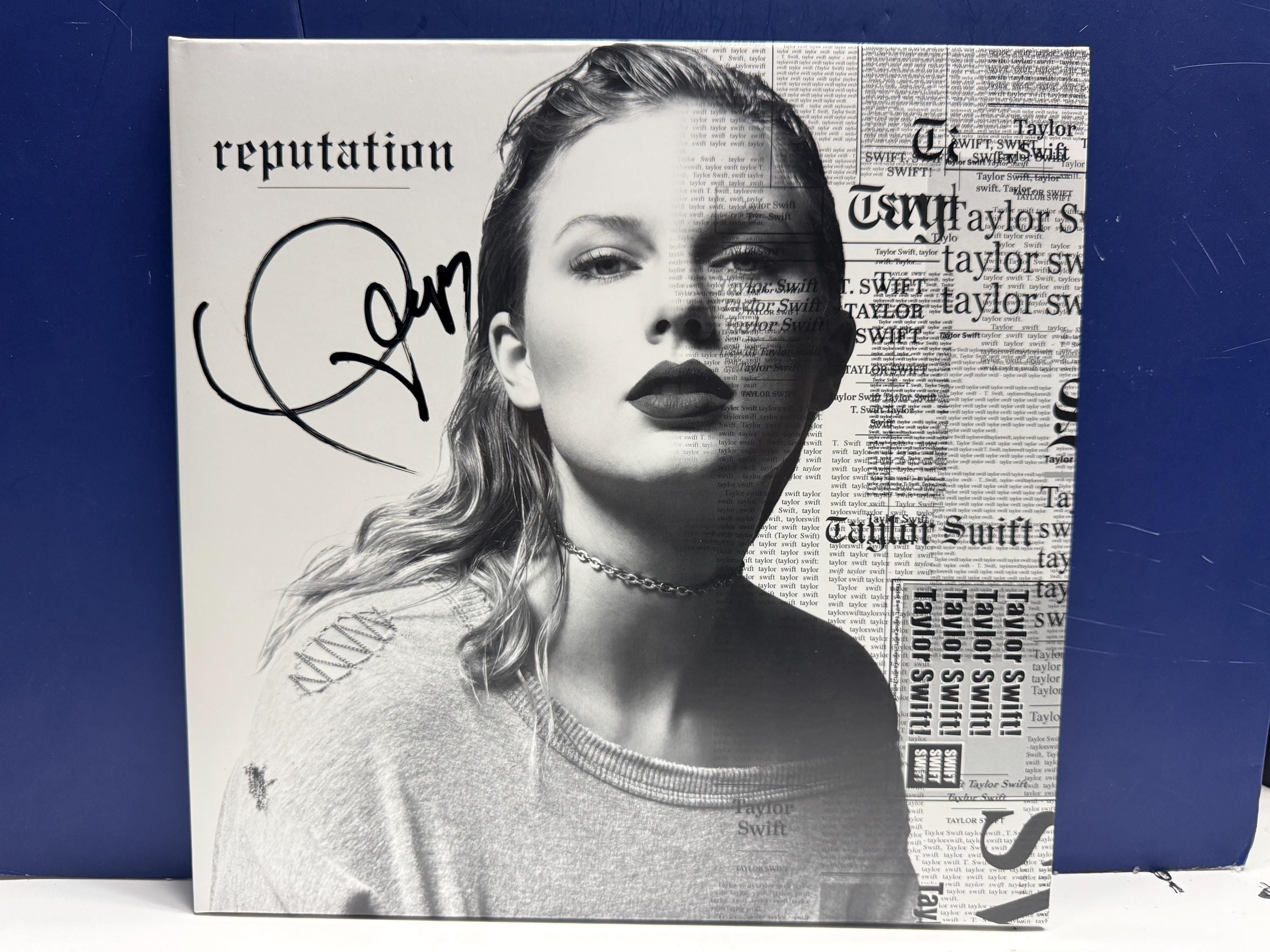 Taylor swift  reputation 直筆サイン il_fullxfull.7342321154_5kae.jpg