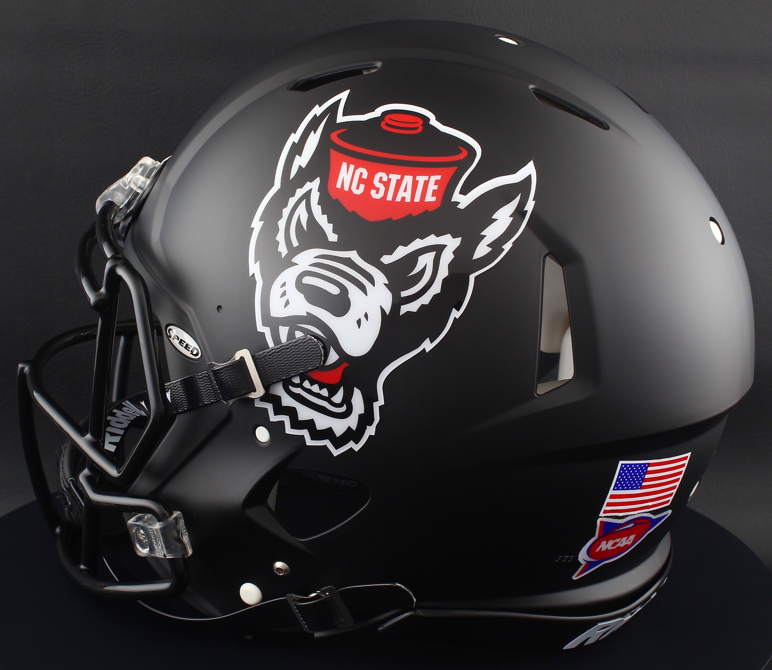 coolest nc state football helmet Wolfpack Riddell Red Wolfhead Replica Speed Official team colors and decals Pack Unveils Helmet for Season