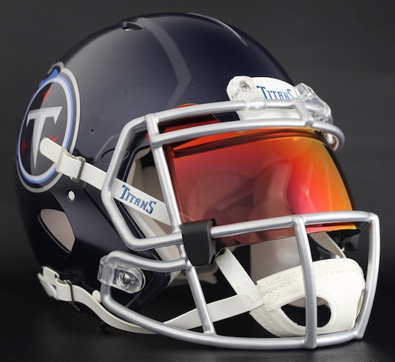a red titan football helmet Tennessee Titans Riddell Speed Replica size display helmet is perfect for football fans and ideal for autographs Jersey are perfect. But this