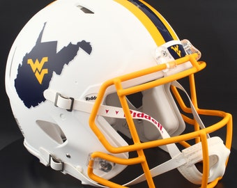May include: White football helmet with a gold and navy blue design. The helmet features a gold face mask, a navy blue and gold stripe, and a navy blue outline of West Virginia with a gold WV logo.