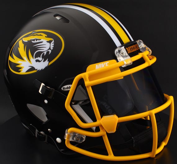 black football helmet with yellow face mask Missouri Tigers NCAA Riddell Speed Full Size Replica Football Helmet With  Customizable Visor!