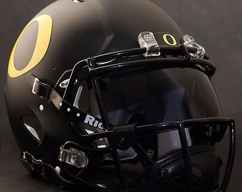 clown helmet football Players like Romeo Doubs are ruining the sport of football by wearing these clown  helmets #BanGuardians