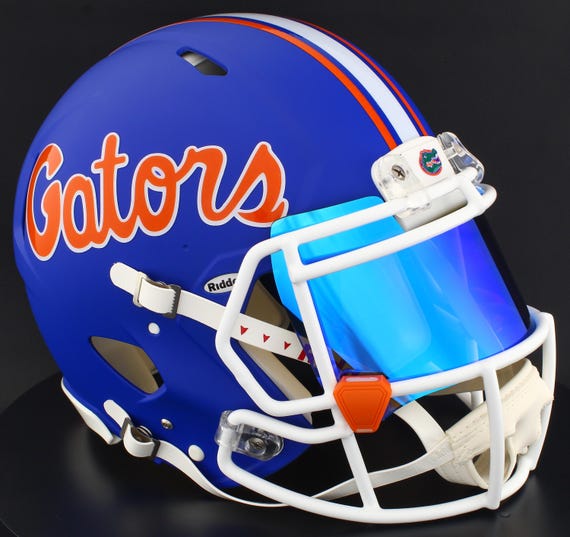 florida football blue helmets Gators Team Helmet Tee This full size Riddell Authentic Speed helmet are the ones worn by college players University of Florida Helmet